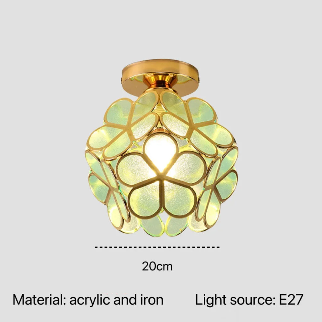 Nordic modern petal acrylic pendant lamp with golden accents and translucent green flower petals for bedroom and foyer lighting