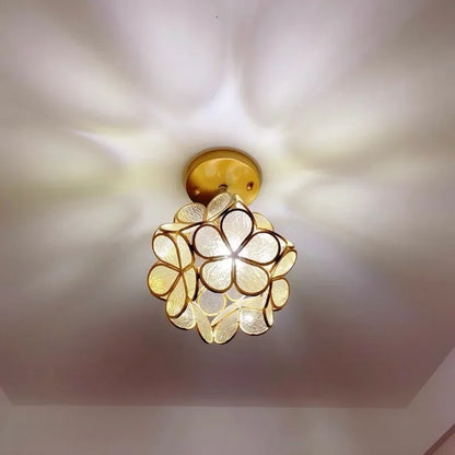Gold-toned nordic modern petal pendant lamp with translucent textured glass petals for bedroom and restaurant lighting