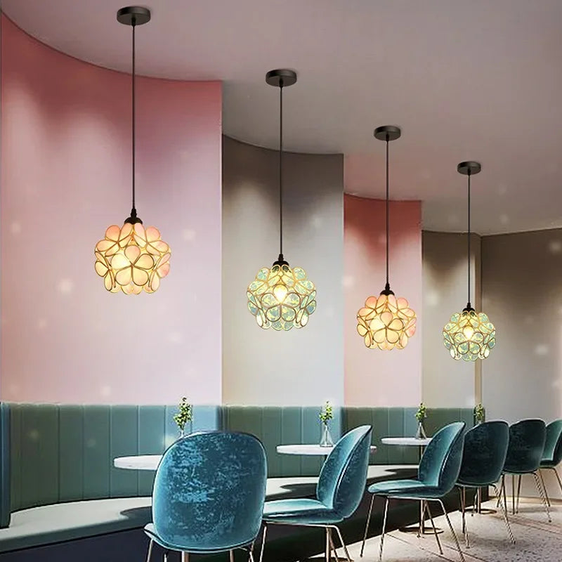 Four nordic modern acrylic pendant lamps with spherical flower-like amber and green shades for bedroom and restaurant lighting
