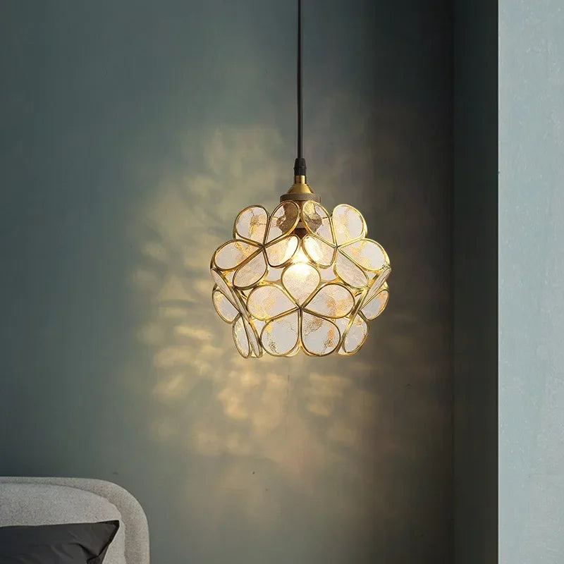 Gold-toned nordic modern petal acrylic pendant lamp with translucent overlapping glass petals for bedroom or restaurant lighting