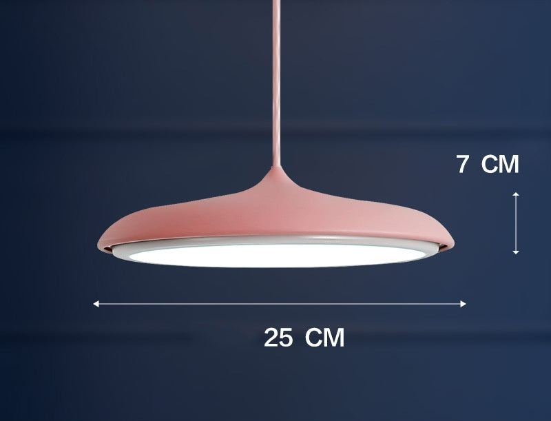 Rose gold pendant light with a matte finish and circular design, 7 cm tall by 25 cm wide.