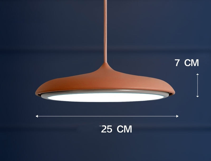 Terracotta pendant light with a modern design and brushed metal finish.