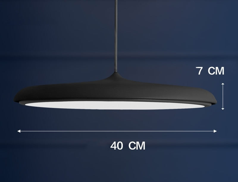Black matte pendant light with white interior, 40 cm diameter and 7 cm height.