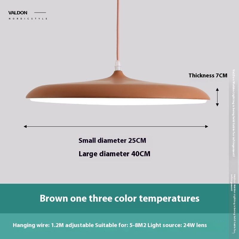 Brown pendant light with three color temperatures, 24w lens and adjustable hanging wire.