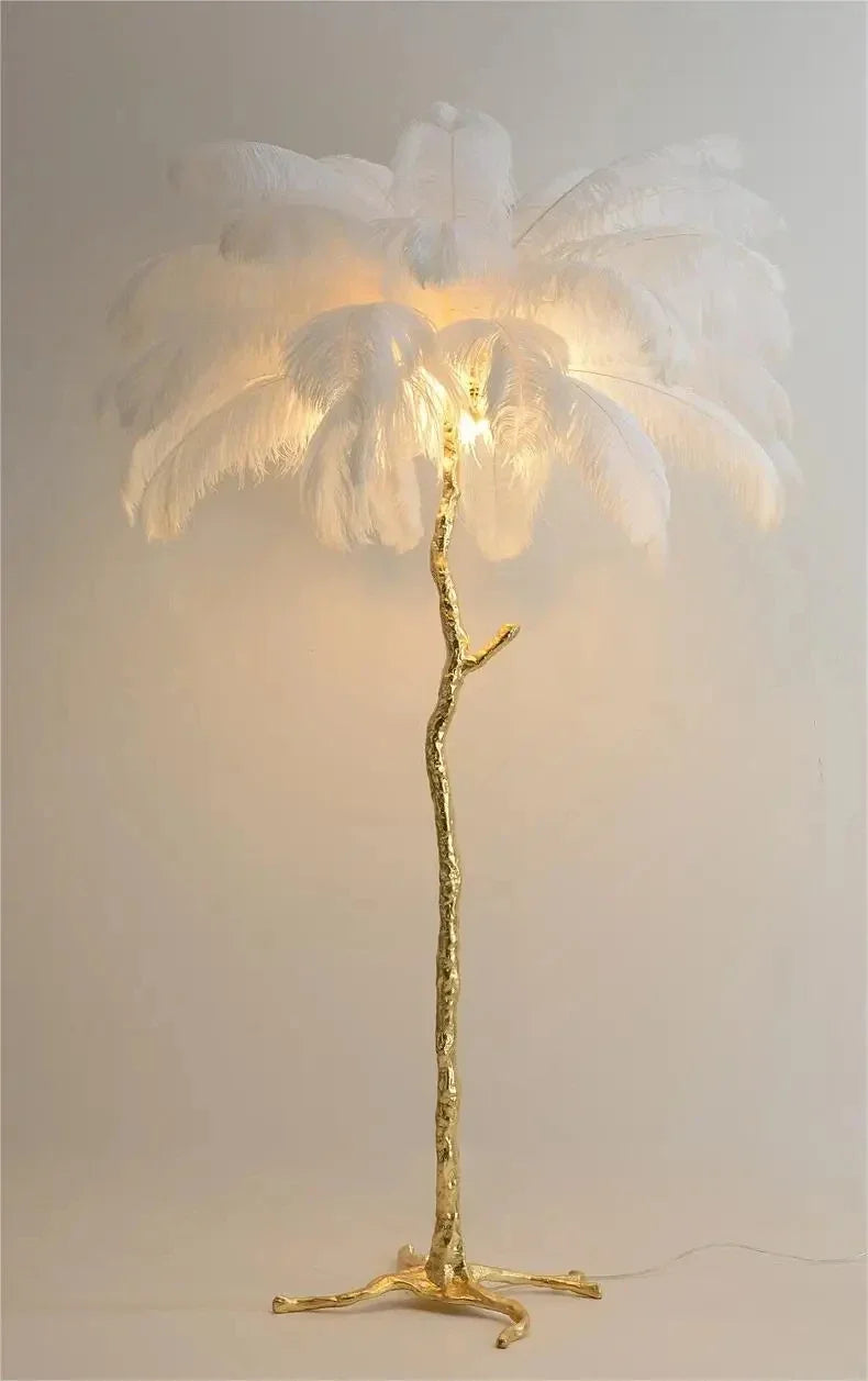 White feather floor lamp with gold-toned branch-like stand for living room and bedroom home decor lighting