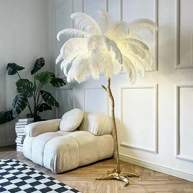White feather floor lamp with gold-toned branch-like base for living room and bedroom decor lighting