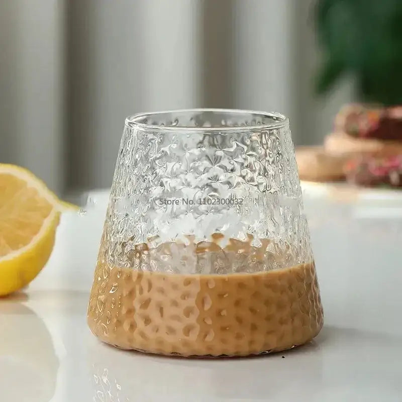 Clear glass tumbler with hammered finish and amber base from Nordic pink glass cocktail cups set for elegant dining decorbites glass cocktail