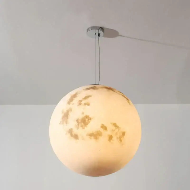 Nordic retro ball moon chandelier pendant light with detailed craters and warm off-white glowing surface for dining room