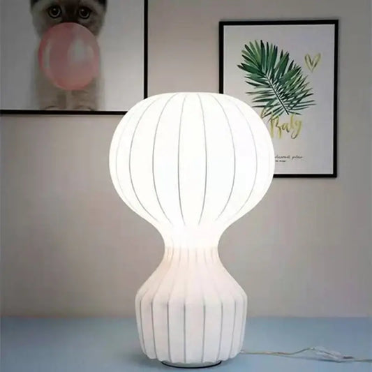 Nordic white silk table lamp with ribbed balloon upper section and fluted base ideal for bedroom decor