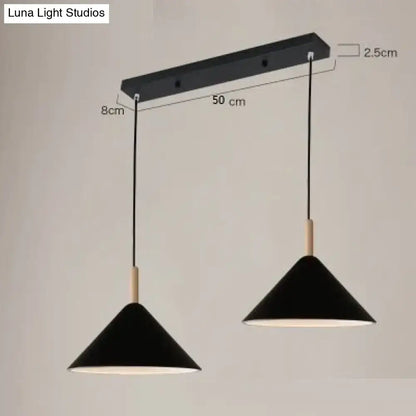Black matte conical nordic simple kitchen pendant light with wooden accents hanging from black rectangular bar