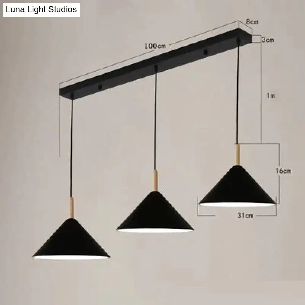 Black conical nordic simple kitchen pendant light with wooden accents hanging from sleek black bar for modern kitchens