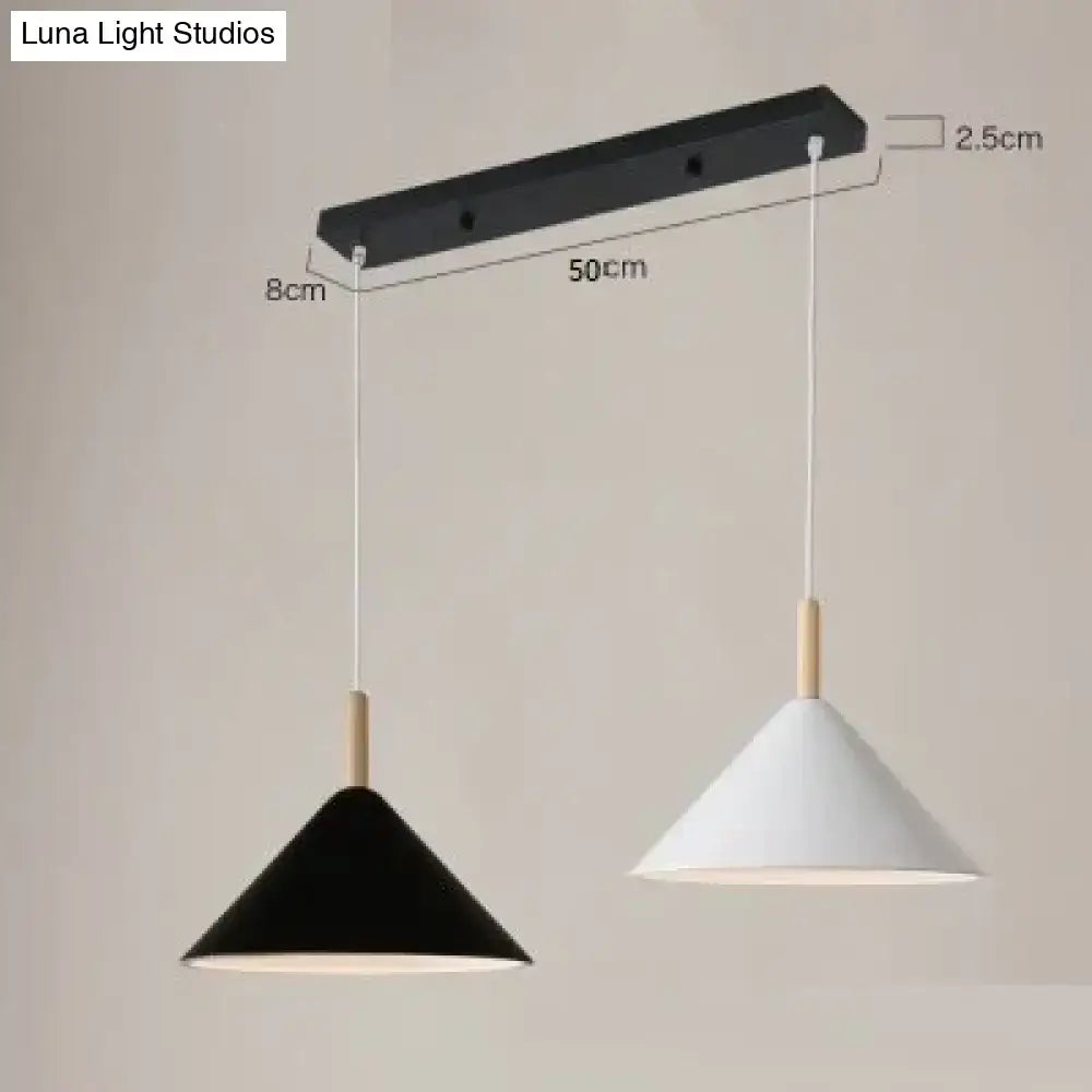 Modern black and white conical pendant light with wooden accents on sleek black bar for nordic simple kitchen use