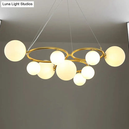 Nordic Style Glass Circles Chandelier: Sleek Suspended Lighting Fixture for Bedrooms