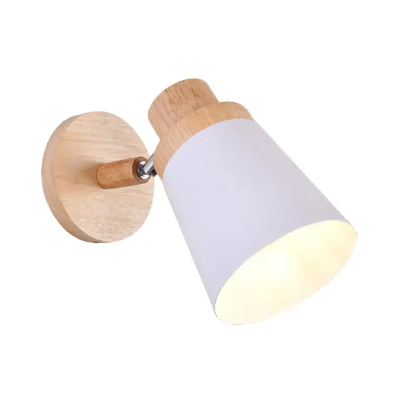 Nordic style wall light with natural wood base and white coolie shade designed for baby room lighting