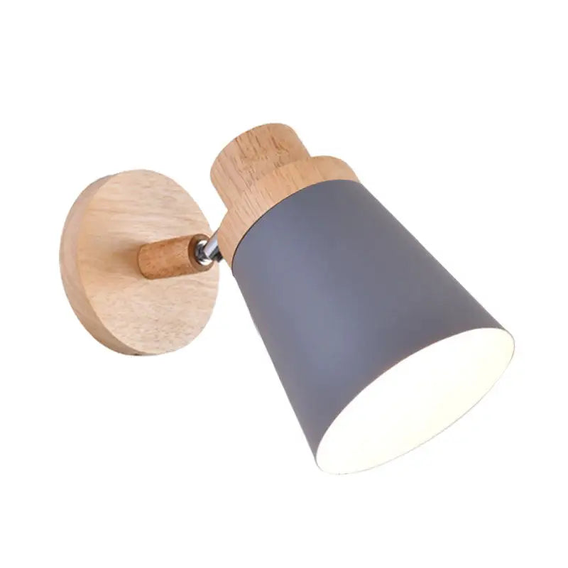 Nordic style wall light with matte gray coolie shade and natural wood accents for baby room lighting
