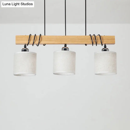 Lámpara colgante LED de estilo nórdico DecorBites™: Lámpara de techo cilíndrica para comedor e isla en tela de madera