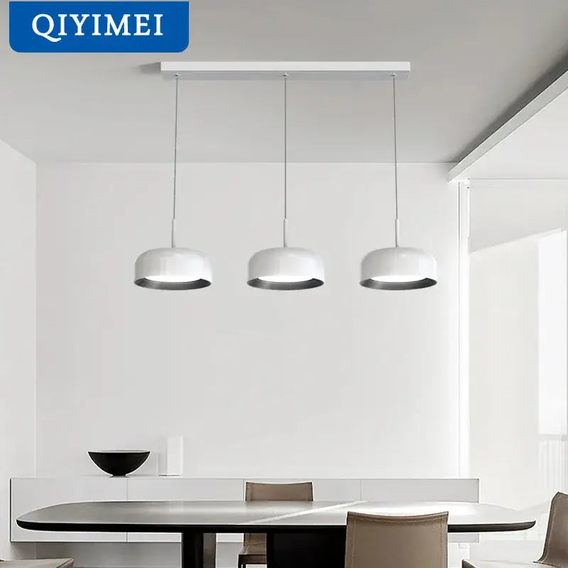 Set of three nordic style white circular chandeliers with sleek silver rims for dining room lighting by decorbites nordic style
