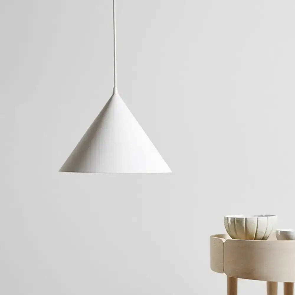 DecorBites™ nordic stylish black metal hanging lamp with a white minimalist conical pendant light over table