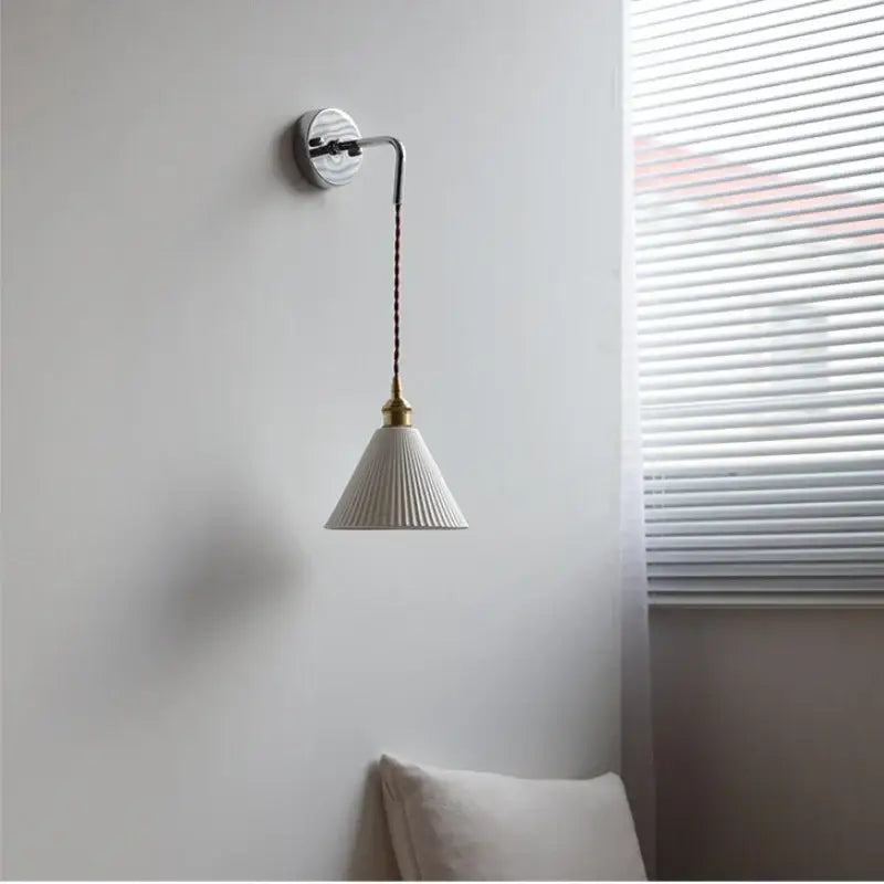 White ceramic led wall light with fluted conical shade and brass accents for bedroom decorbites ceramic led use