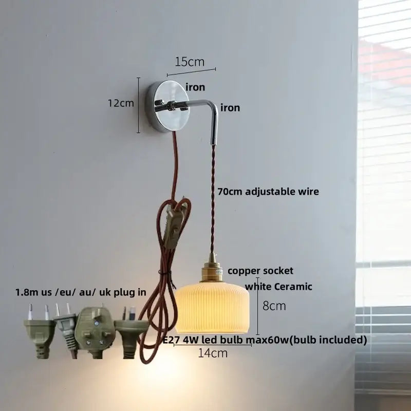 A warm glowing white ceramic led wall light with ribbed design and brass copper socket for bedroom decorbites ceramic led
