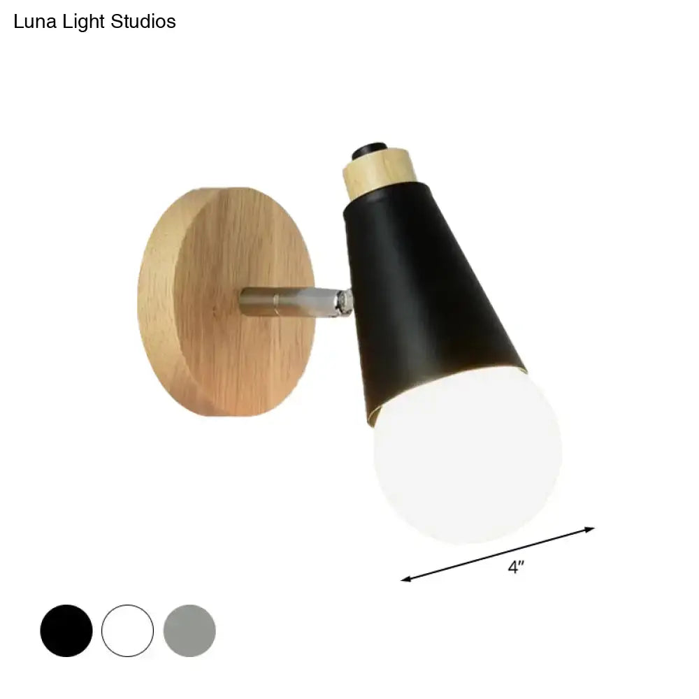 Black conical nordic sweet cone wall light with natural bamboo base and matte metal arm featuring integrated globe bulb for bedroom