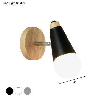 Black conical nordic sweet cone wall light with natural bamboo base and matte metal arm featuring integrated globe bulb for bedroom