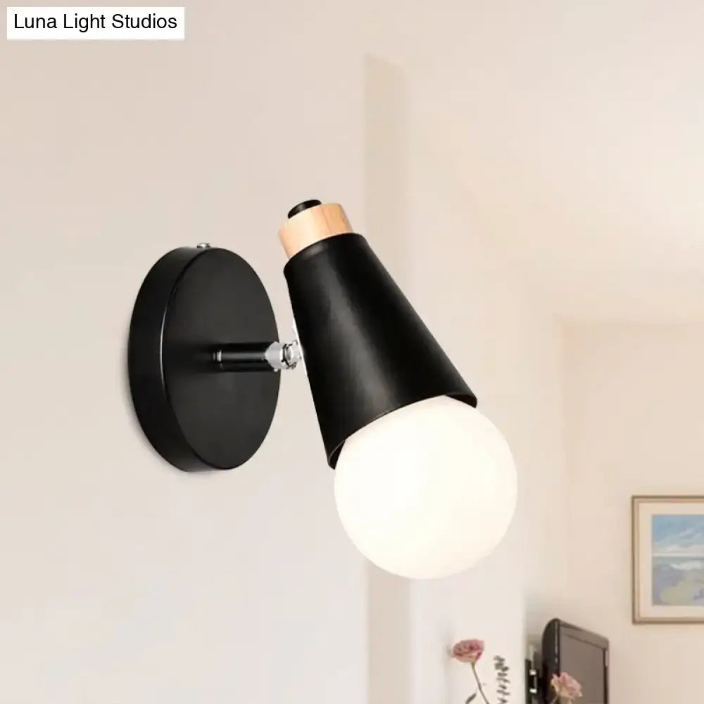 Nordic sweet cone wall light in black matte with bamboo base and wooden accent holding an opaque white bulb