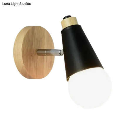 Black nordic sweet cone wall light with a natural wood bamboo base and metallic arm for bedroom lighting