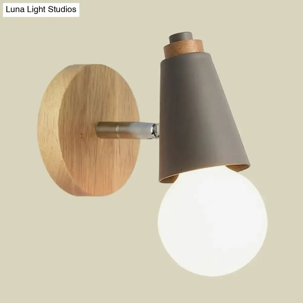 Modern nordic sweet cone wall light with round wooden backplate, matte gray conical shade, cork accent, and bamboo base for bedroom