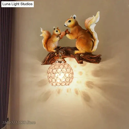 Nordic vintage style brown resin squirrel wall lamp with crystal globe shade for bedroom lighting