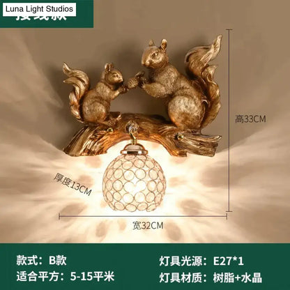 Golden resin vintage style wall lamp featuring a crystal squirrel on a textured branch base for bedroom lighting
