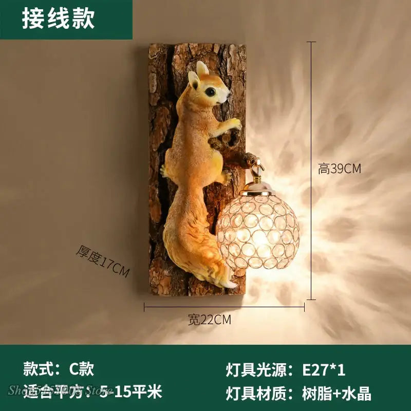 A nordic vintage style resin squirrel wall lamp in golden brown mounted on a textured tree trunk base with crystal globe lamp