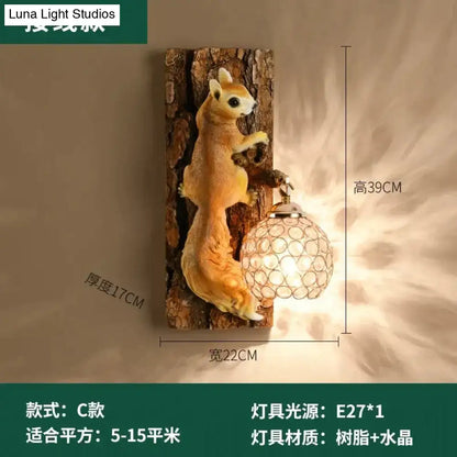 A nordic vintage style wall lamp featuring an orange vintage style resin squirrel on a rustic tree bark sconce
