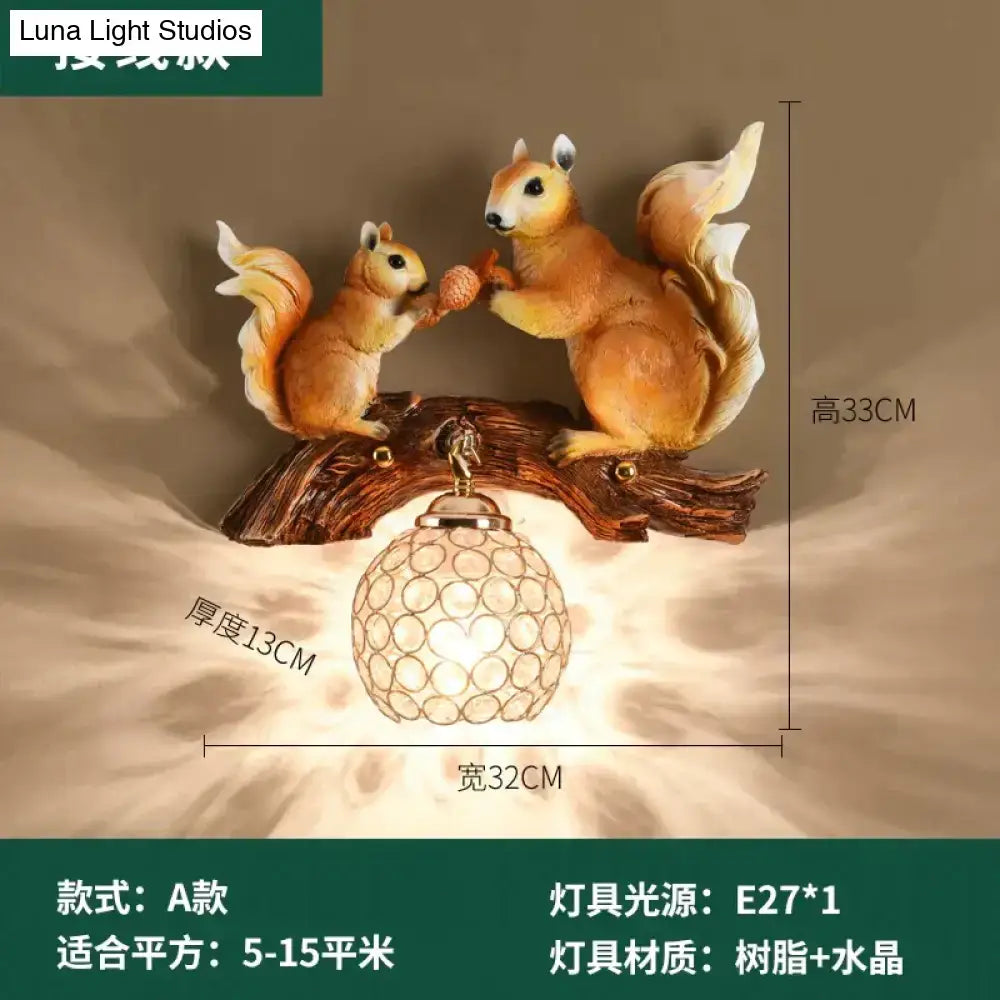 Nordic vintage style resin wall lamp with warm-toned squirrels on rustic branch and crystal globe shade
