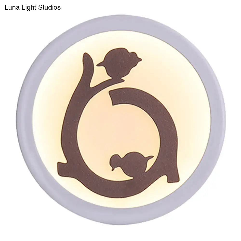 Nordic white and brown bird led wall sconce features a circular inch fixture with dark silhouette and soft glow light