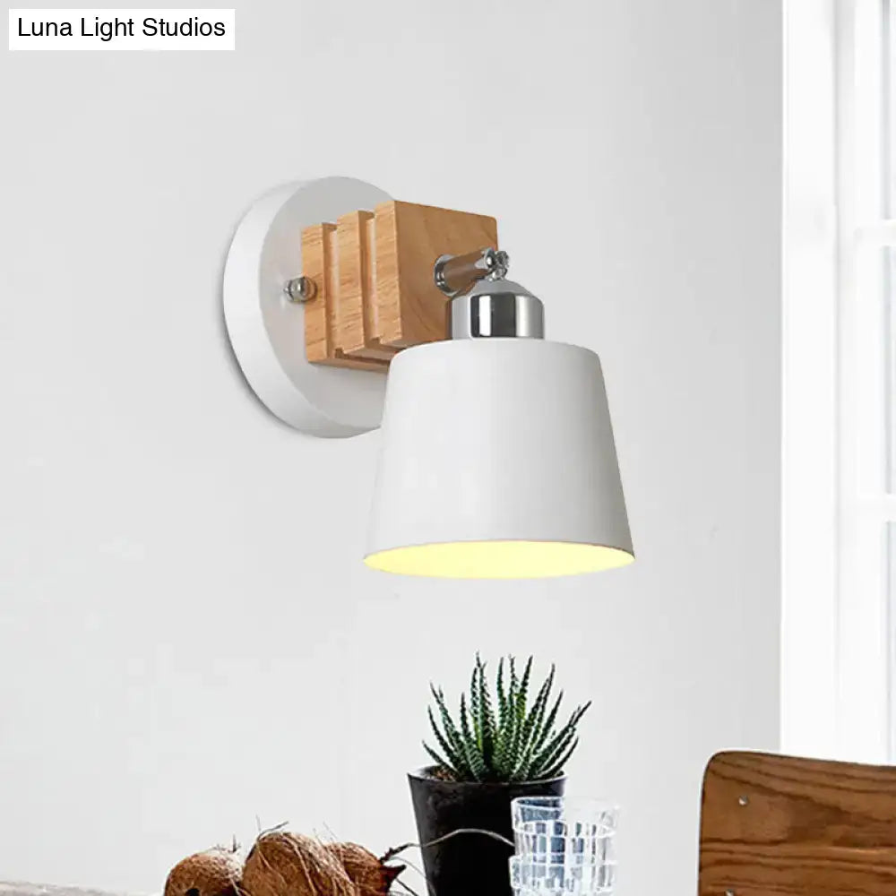 Nordic white ceramic rotatable wall lamp with chrome arm and wooden accent mounted on white circular wall plate
