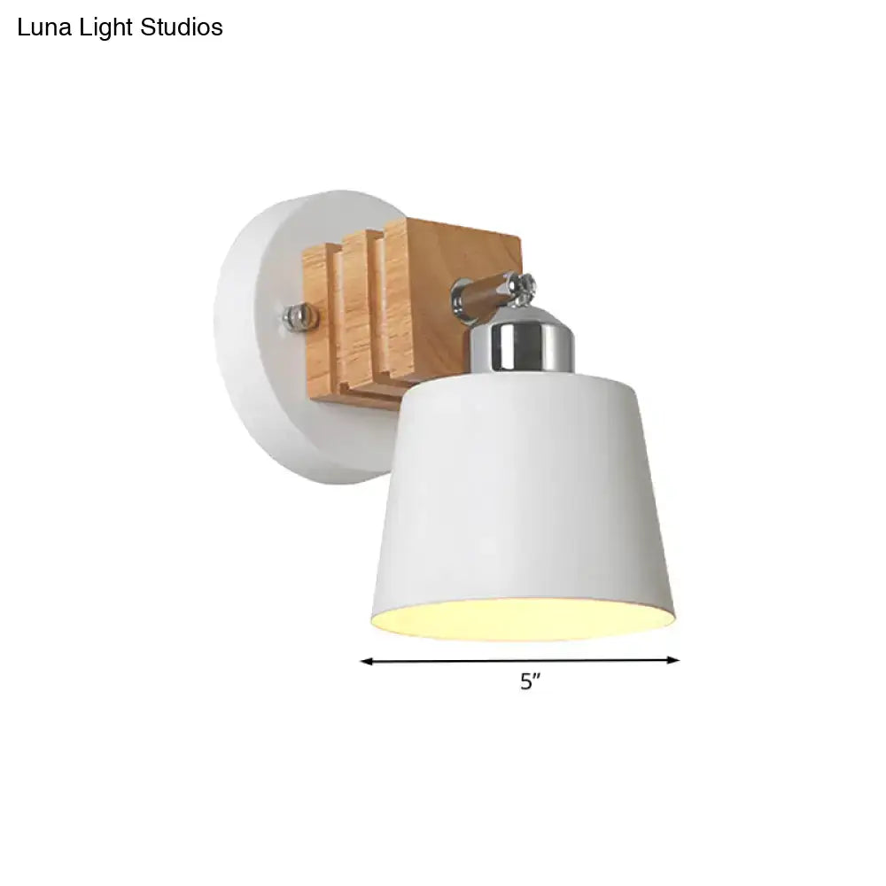 Nordic white ceramic rotatable wall lamp with chrome arm and wooden accent on circular white wall plate wall light