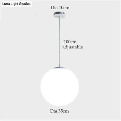 DecorBites nordic white glass ball pendant lights with frosted glass globe and chrome hardware for modern living rooms