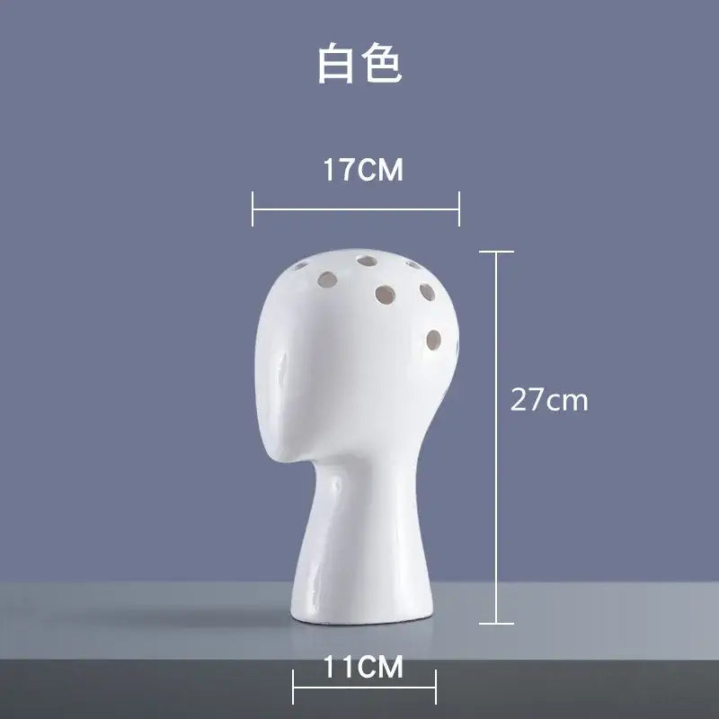 Nordic white ceramic human head vase with five circular holes for living room decorbites human head decor