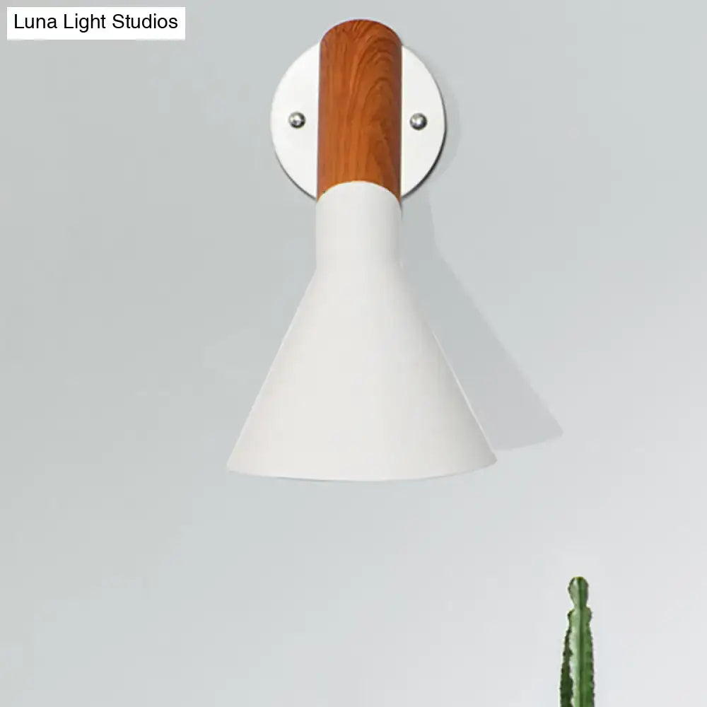 Modern wall light with white conical shade, wooden handle, and metal backplate for bedroom monochrome wall light