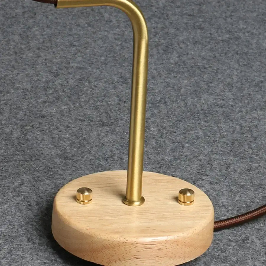 Nordic white ribbed ceramic wood wall sconce with brass finish metal lamp stand on light wood base decorbites ceramic wood wall