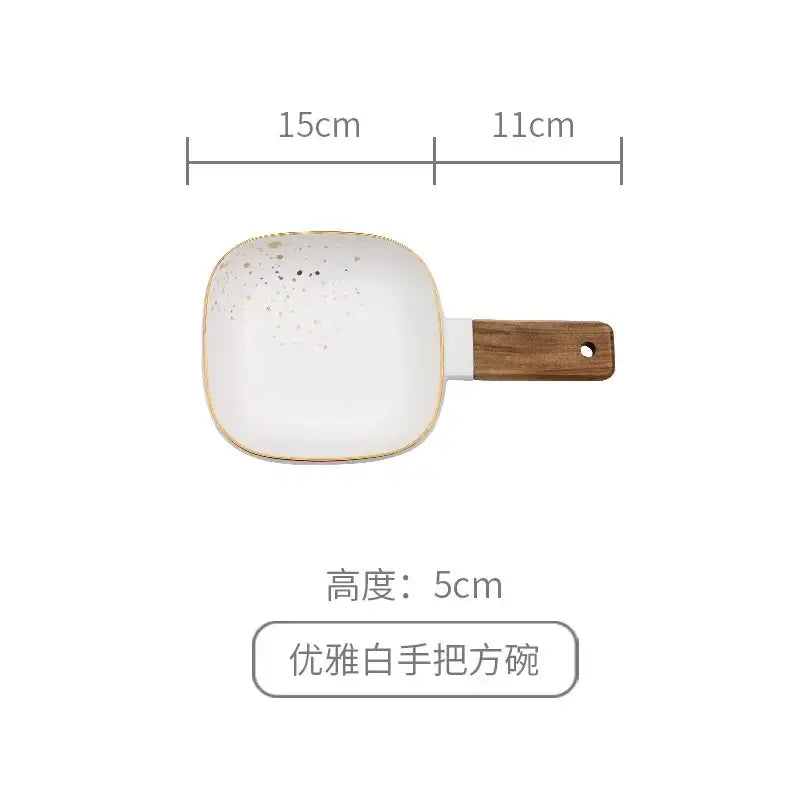 Nordic white speckled ceramic wood handle bowl with gold rim and wooden handle featured in decorbites ceramic wood collection