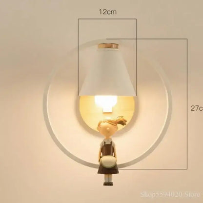 A white conical lampshade with gold rim mounted above a wooden figurine in the nordic birdie wall lamp