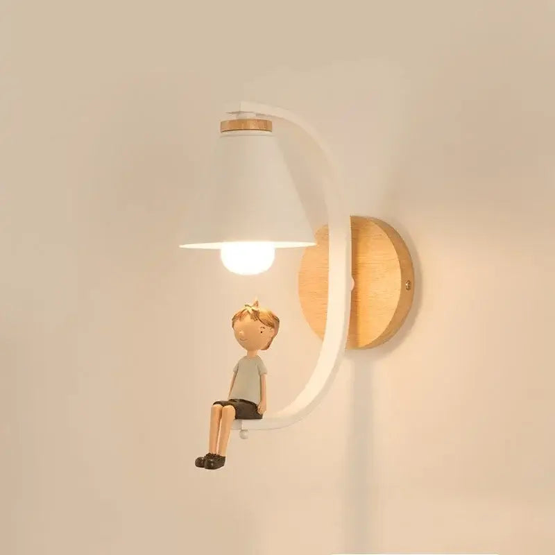 White conical ceramic birdie wall lamp with wooden backplate and figurine boy detail for bedroom lighting