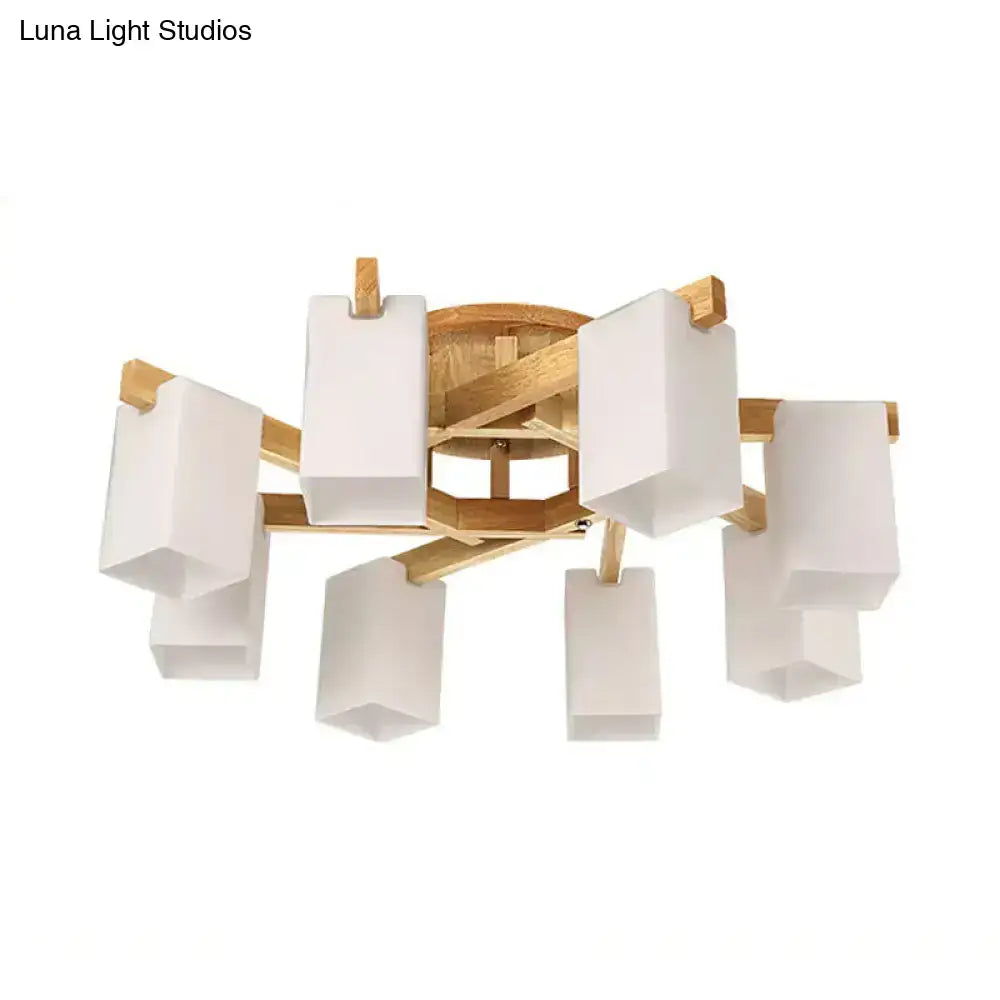 Modern minimalist ceiling lamp with natural wood frame and six cuboid cream glass shades for living room lighting