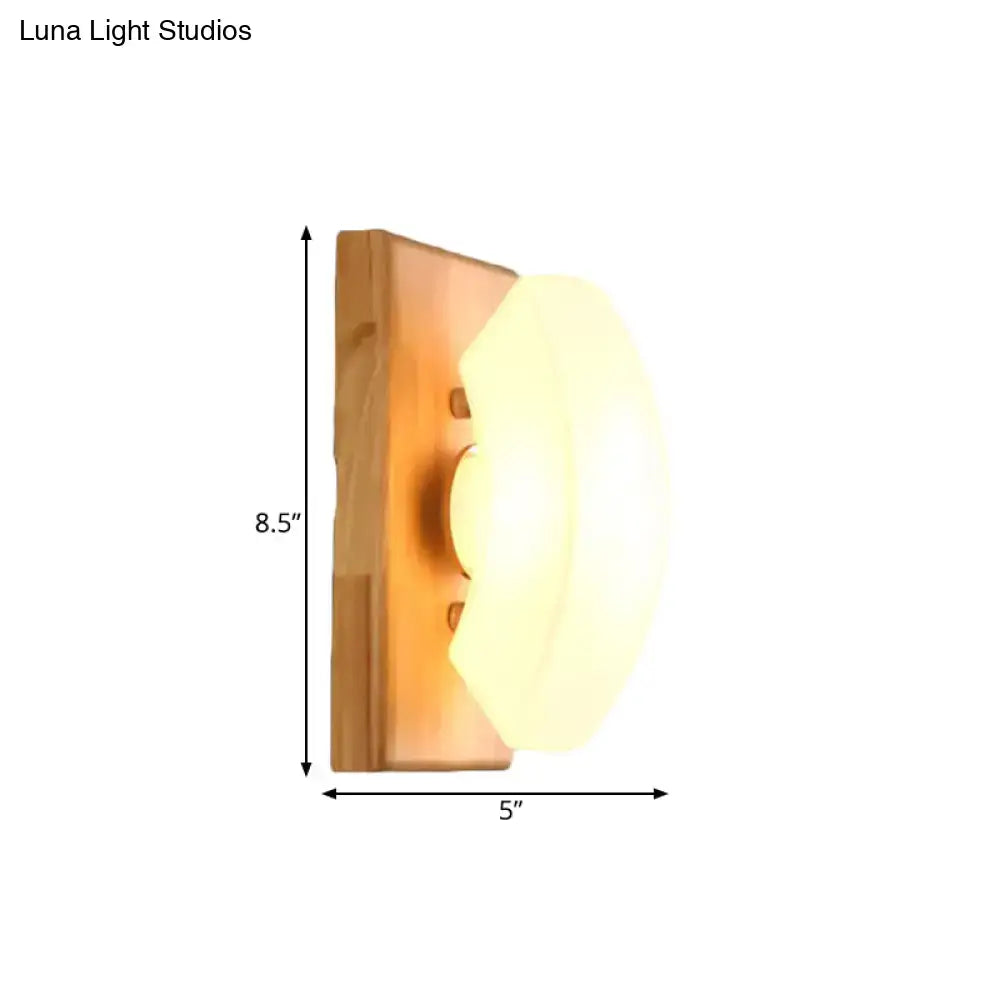 Nordic wall light with warm-toned wood and frosted white glass shade suitable for 220v-240v 110v-120v bedroom use