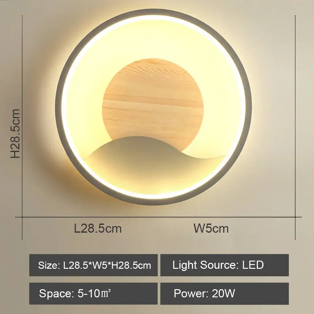 Circular nordic wood and led wall light with warm glow featuring light wood center and metallic frame for bedroom decorbites led wall