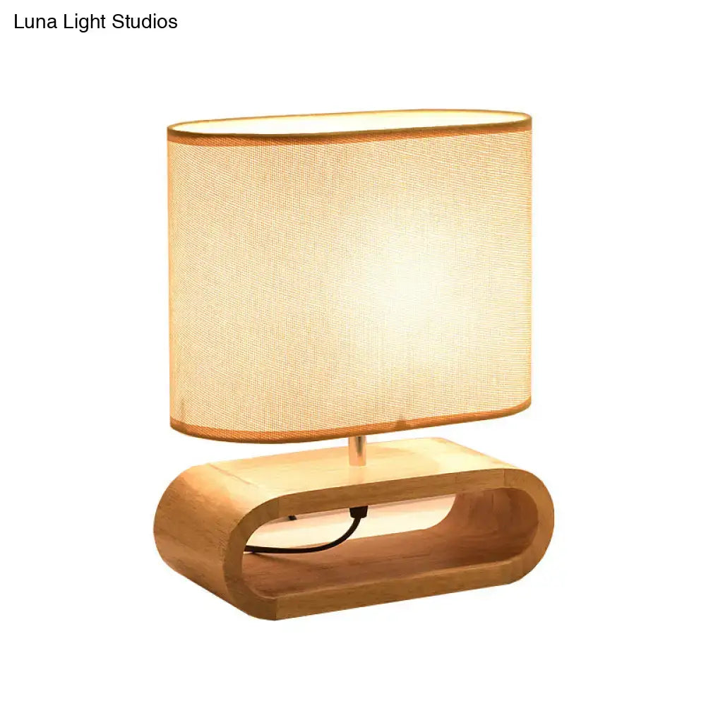 Nordic wood bedside table light with warm-toned oval shade and curved wooden base 12 inch fixture for bedroom