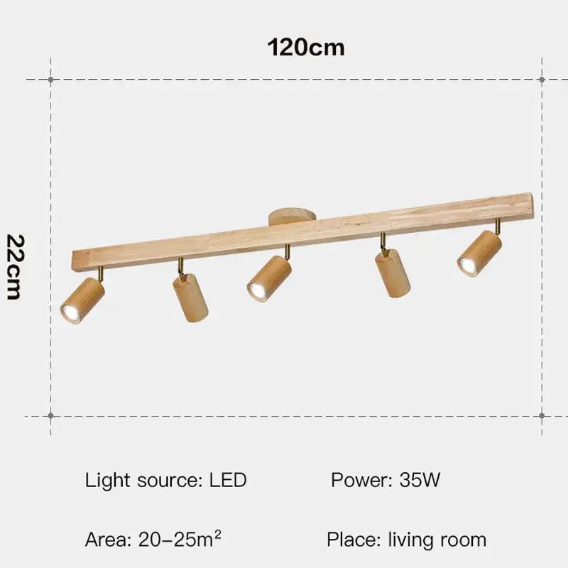 Minimalist nordic woodentrack led ceiling spotlight with five cylindrical bamboo-style fixtures on a natural wood bar