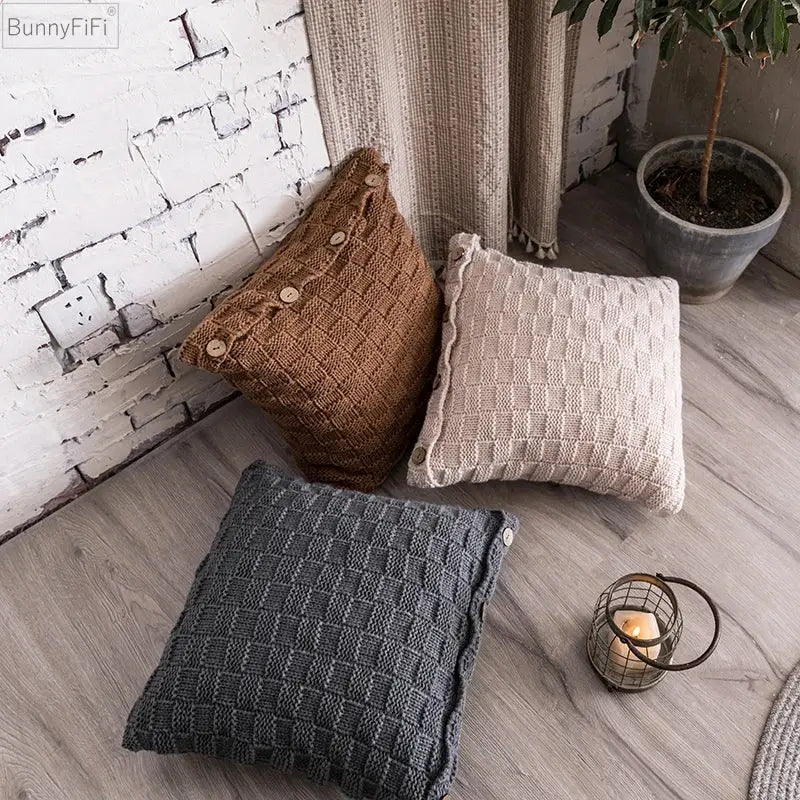 Three earthy-toned decorbites knit pillow covers with textured checkered pattern and button closure for living room decor